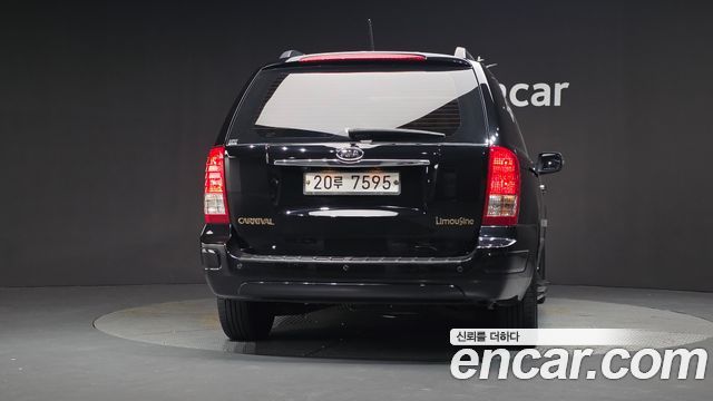 Kia Canival 2011 — photo 4