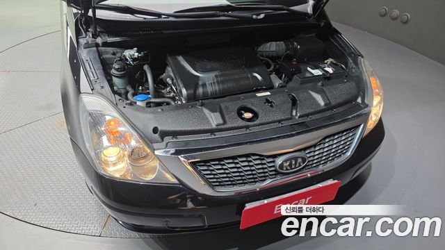 Kia Canival 2011 — photo 6