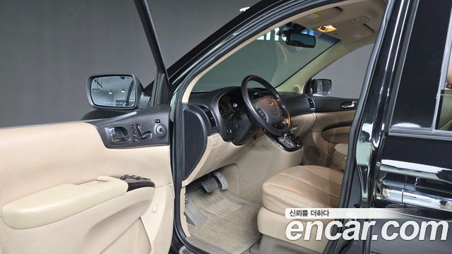 Kia Canival 2011 — photo 10