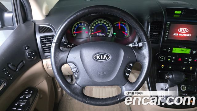 Kia Canival 2011 — photo 13