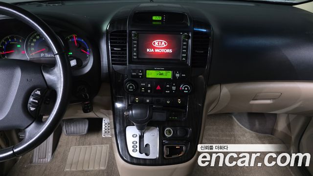Kia Canival 2011 — photo 14