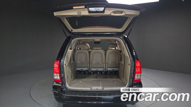Kia Canival 2011 — photo 19