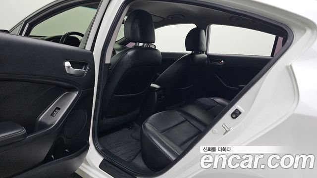 Kia K3 2014 — photo 11