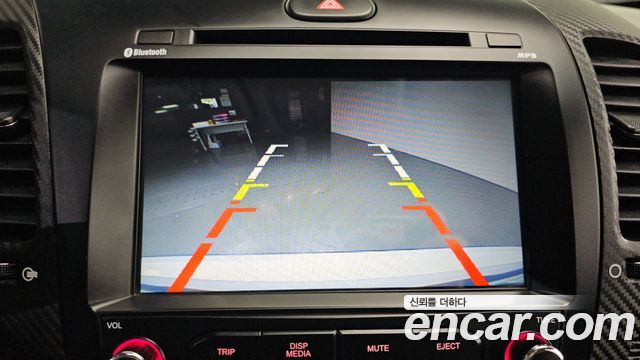 Kia K3 2014 — photo 18