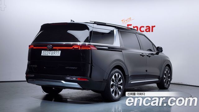 Kia Canival 2021 — photo 2