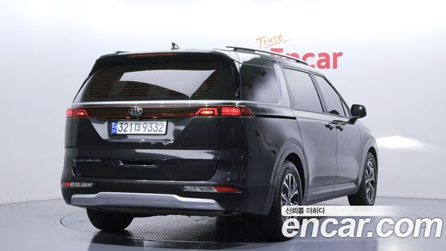 Kia Canival 2021 — photo 2