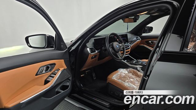 BMW 3-Series 2024 — photo 13
