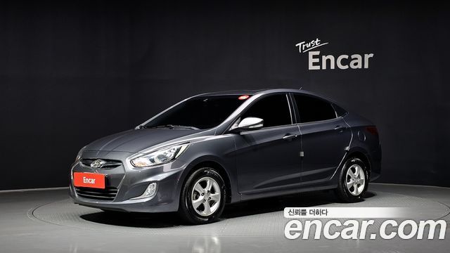 Hyundai Accent 2012 — photo 1