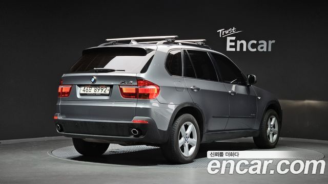 BMW X5 2009 — photo 2