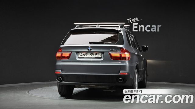 BMW X5 2009 — photo 4