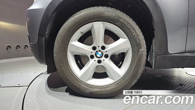 BMW X5 2009 — photo 5