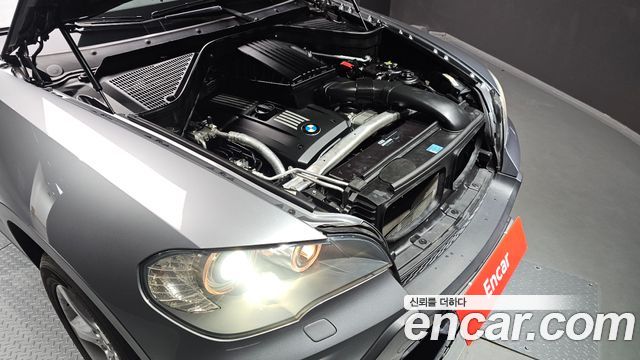 BMW X5 2009 — photo 6