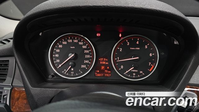 BMW X5 2009 — photo 8