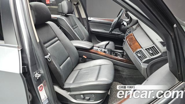 BMW X5 2009 — photo 12