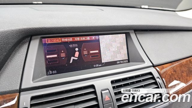 BMW X5 2009 — photo 14