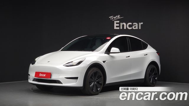 Tesla Model Y 2023 — photo 1