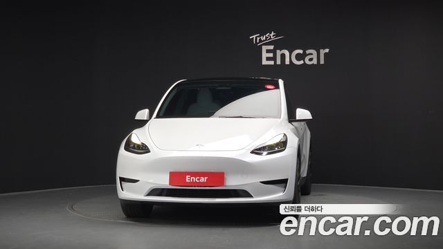 Tesla Model Y 2023 — photo 3