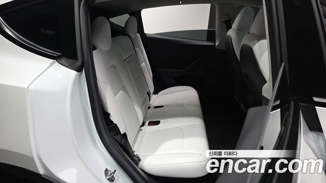 Tesla Model Y 2023 — photo 18