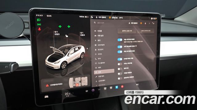 Tesla Model Y 2023 — photo 29
