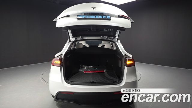 Tesla Model Y 2023 — photo 33
