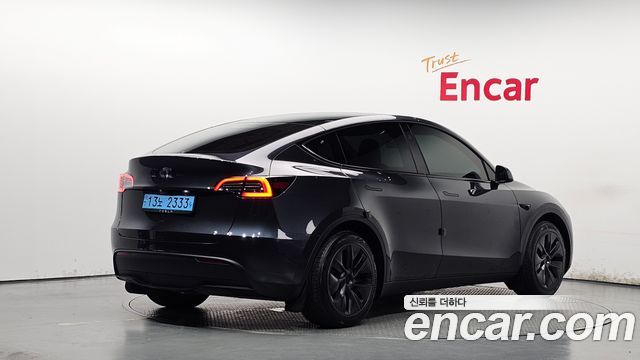 Tesla Model Y 2025 — photo 2