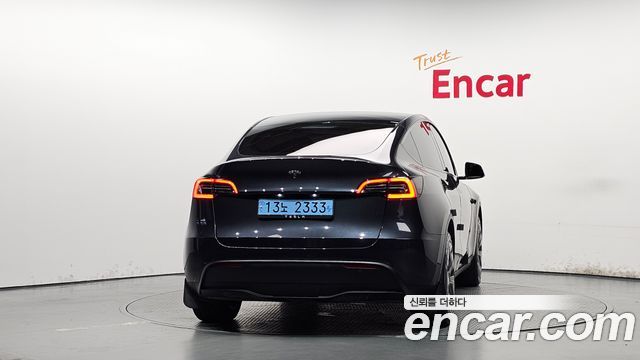 Tesla Model Y 2025 — photo 4