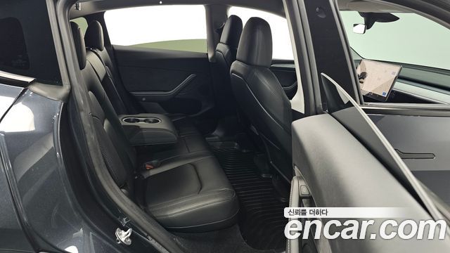 Tesla Model Y 2025 — photo 18
