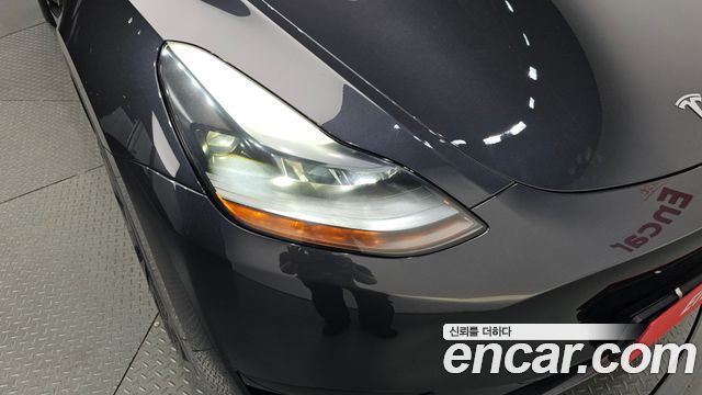 Tesla Model Y 2025 — photo 8