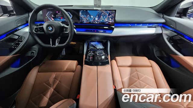 BMW 5-Series 2025 — photo 10