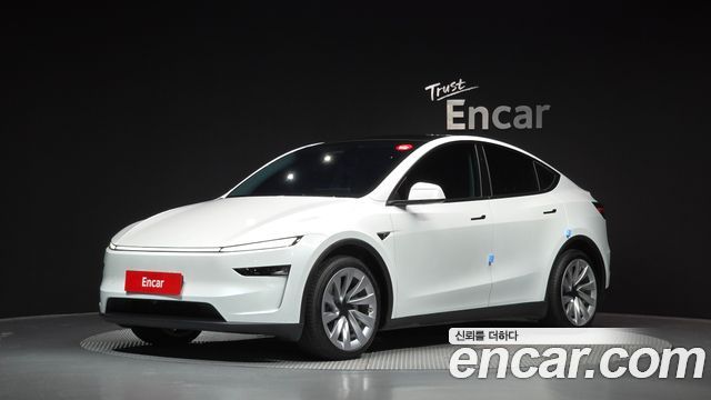 Tesla Model Y 2025 — photo 1