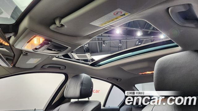 BMW 5-Series 2012 — photo 19