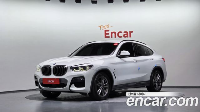 BMW X4 2021 — photo 1