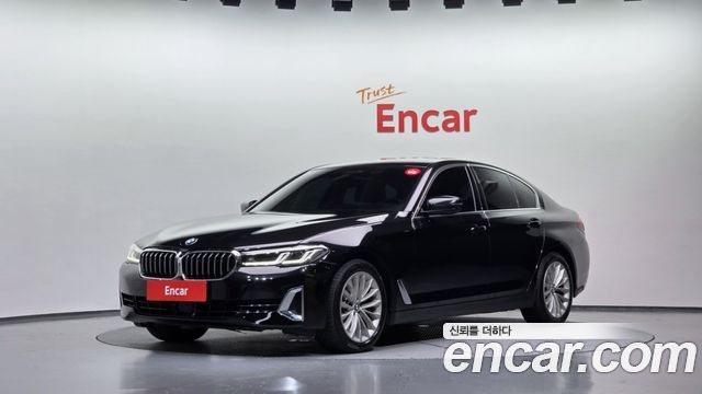BMW 5-Series 2023 — photo 1