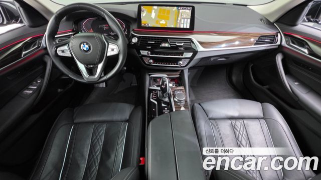 BMW 5-Series 2023 — photo 10