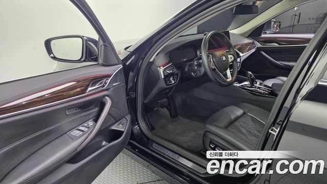 BMW 5-Series 2023 — photo 13