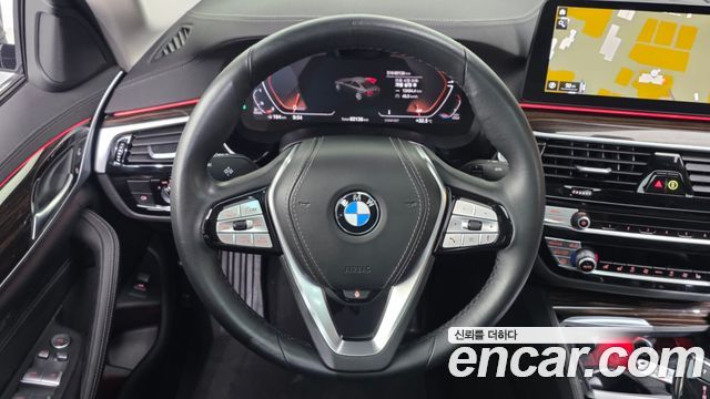 BMW 5-Series 2023 — photo 19