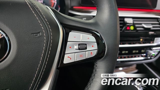 BMW 5-Series 2023 — photo 27