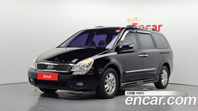Kia Canival 2012 — photo 1