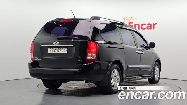 Kia Canival 2012 — photo 2
