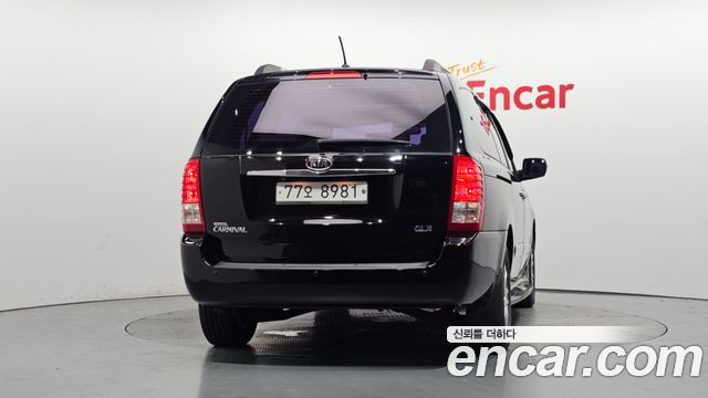 Kia Canival 2012 — photo 4