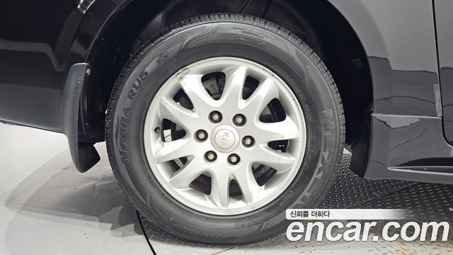 Kia Canival 2012 — photo 5
