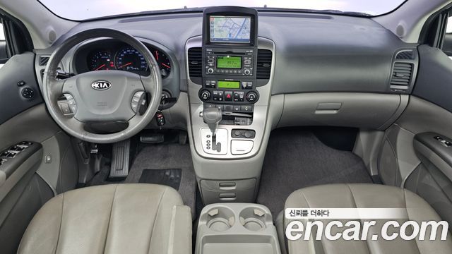 Kia Canival 2012 — photo 10