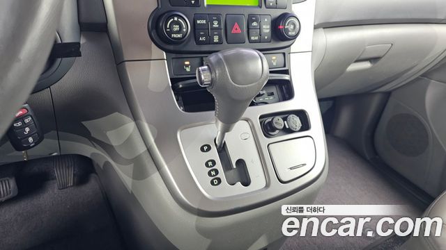 Kia Canival 2012 — photo 12