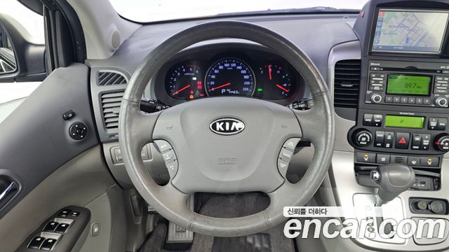 Kia Canival 2012 — photo 19