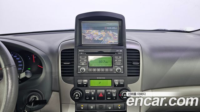 Kia Canival 2012 — photo 20