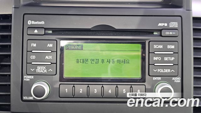 Kia Canival 2012 — photo 22