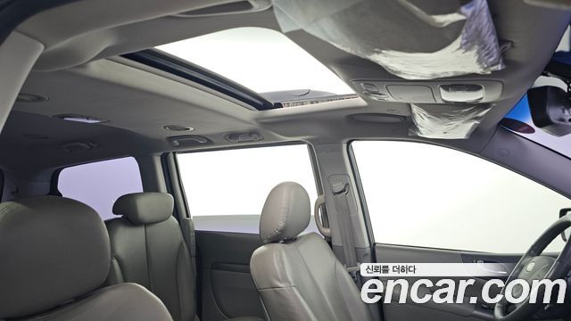 Kia Canival 2012 — photo 26