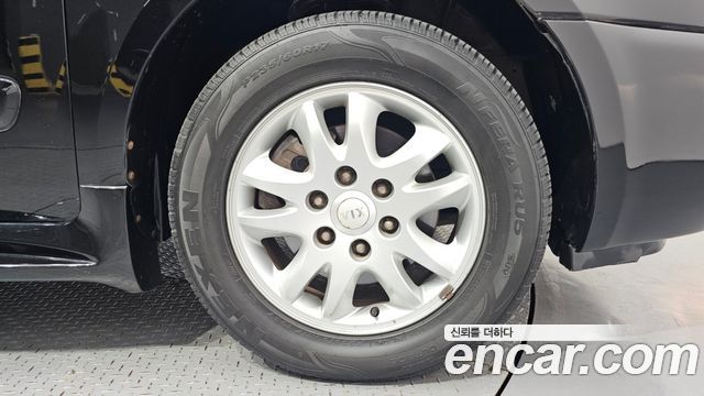 Kia Canival 2012 — photo 7