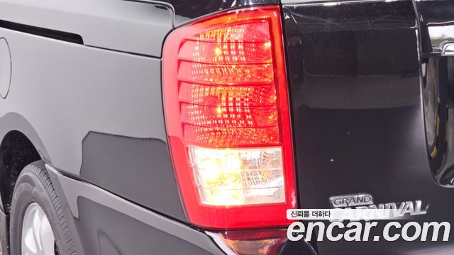 Kia Canival 2012 — photo 9