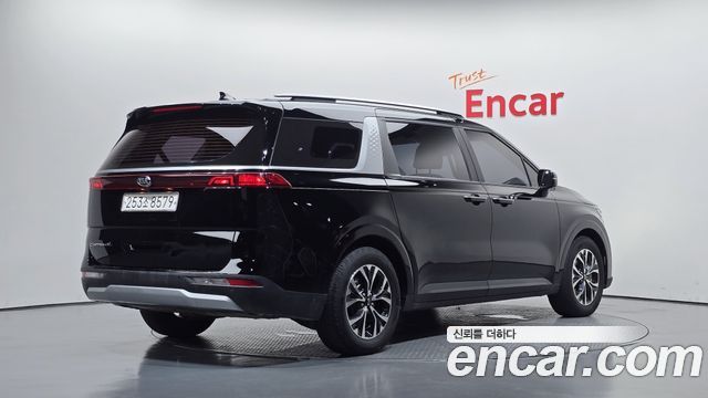 Kia Canival 2021 — photo 2